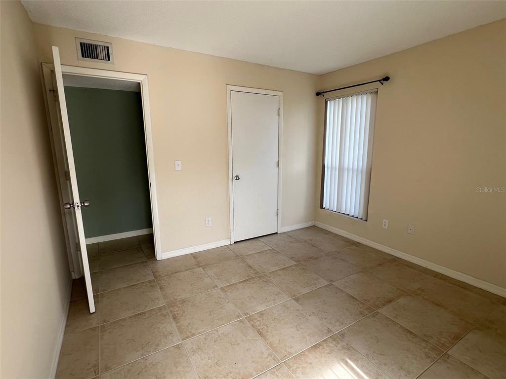 455 Alt 19, Unit 159 Palm Harbor, FL 34683 - Photo 14 of 26 an empty room with closet