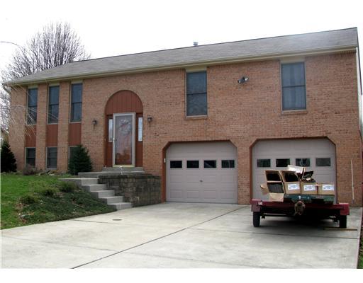 Exterior Front. 11 year old Brick / Vinyl oversized split entry