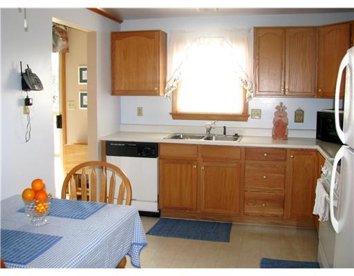 Exterior Front. Fully equipped eat in kitchen w/ open bulk head