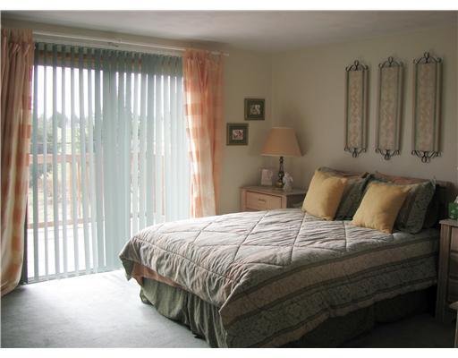 Bedroom. Master bedroom w/ sliding glass doors to deck, lite closets & masterbathroom