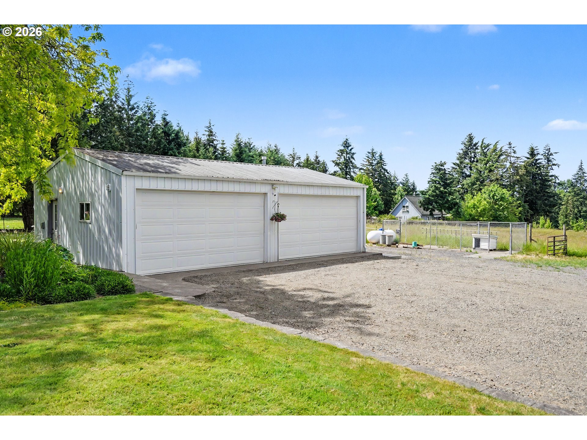 15055 Southeast Foster Road Dayton, OR 97114 - Photo 39 of 47 a backyard of a house with lots of green space