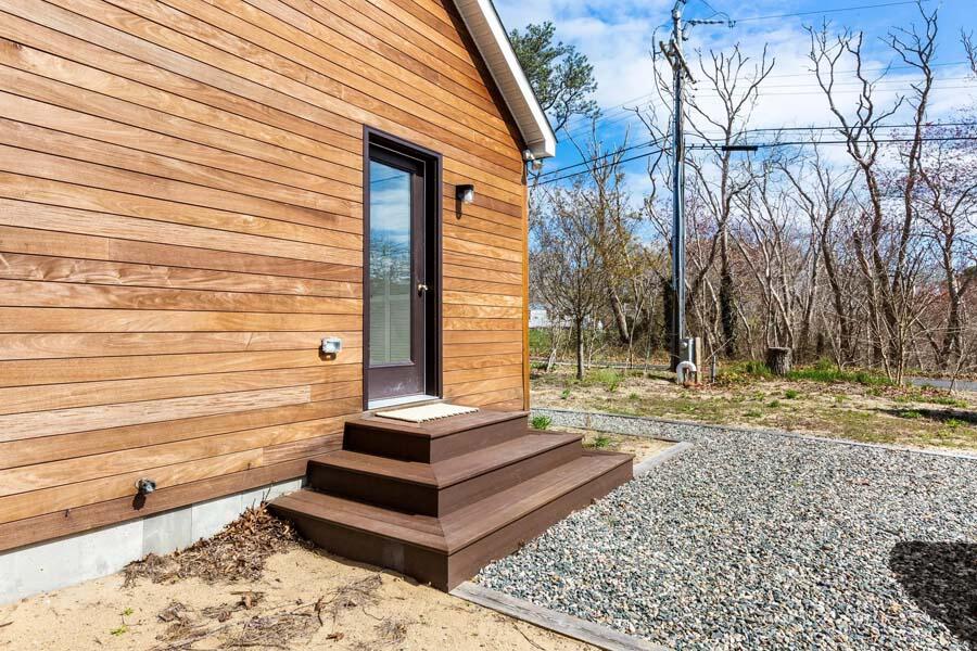 135 Old Truro Road Wellfleet, MA 02667 - Photo 11 of 38 a view of a yard with wooden fence