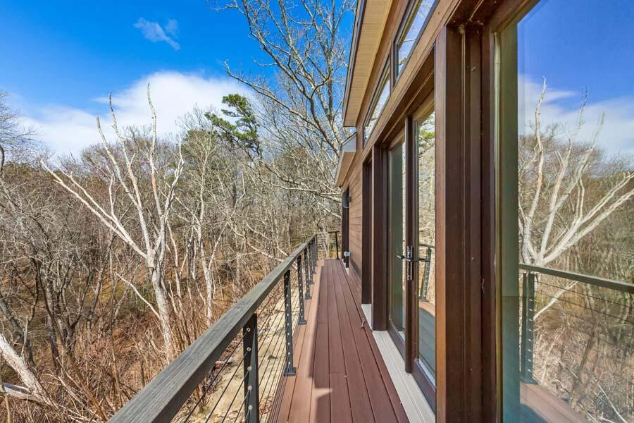 135 Old Truro Road Wellfleet, MA 02667 - Photo 12 of 38 a view of balcony with wooden floor and fence