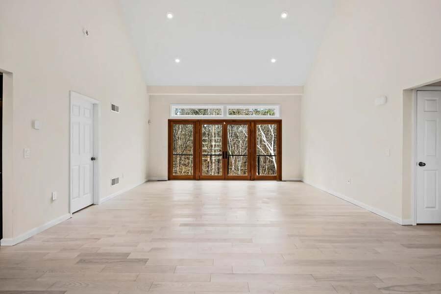 135 Old Truro Road Wellfleet, MA 02667 - Photo 14 of 38 a view of an empty room with a window