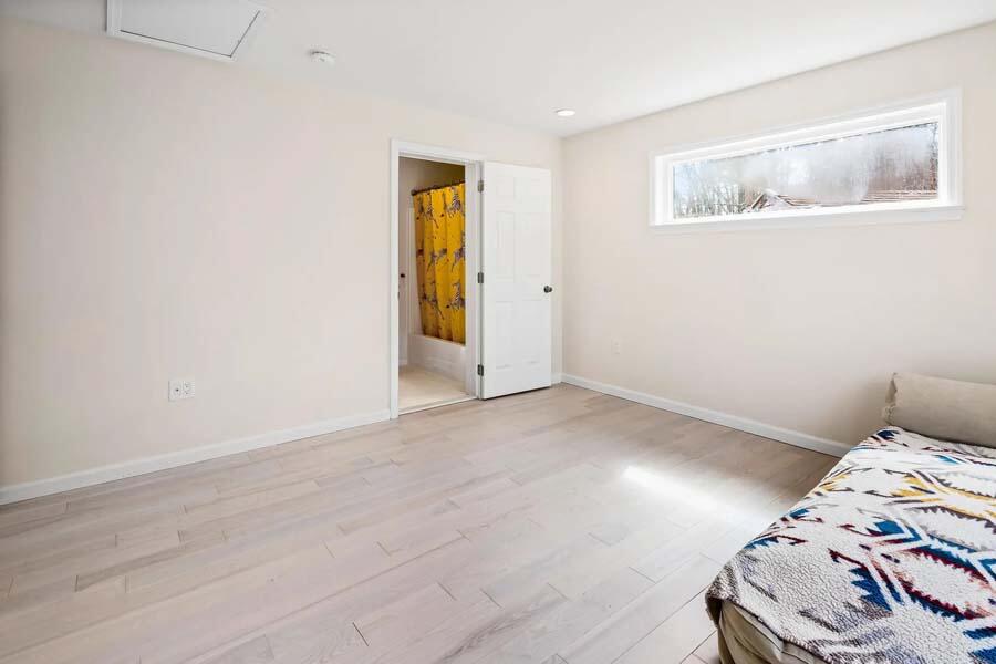 135 Old Truro Road Wellfleet, MA 02667 - Photo 21 of 38 a view of bedroom with bed and workspace