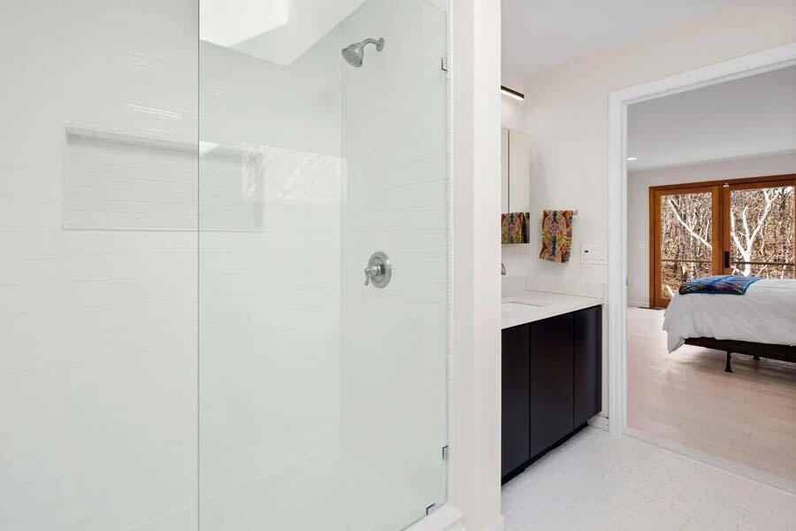 135 Old Truro Road Wellfleet, MA 02667 - Photo 28 of 38 a en suite bathroom with a sink and a mirror