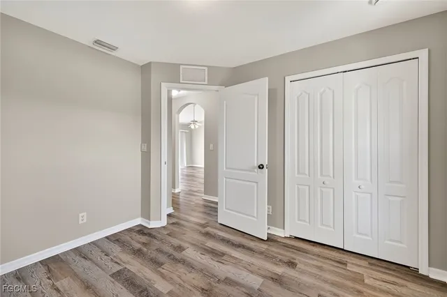 a view of entryway with wooden floor
