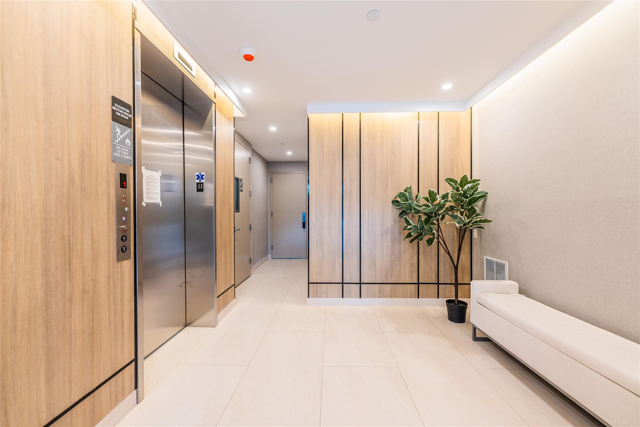 42-09 Hampton Street, Unit 4B Queens, NY 11373 - Photo 15 of 16 a view of a bathroom with a tub shower and mirror