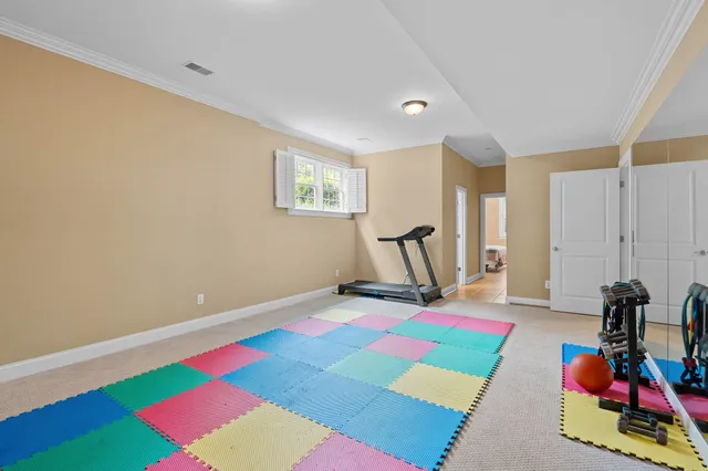 a view of room with gym equipment
