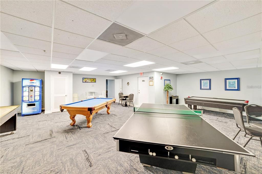 5915 Sea Ranch Drive, Unit 211 Hudson, FL 34667 - Photo 20 of 26 a room with furniture pool table and windows