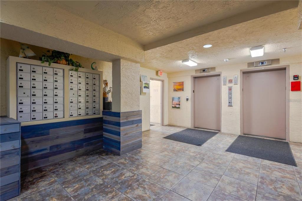 5915 Sea Ranch Drive, Unit 211 Hudson, FL 34667 - Photo 25 of 26 a view of entryway with stairs
