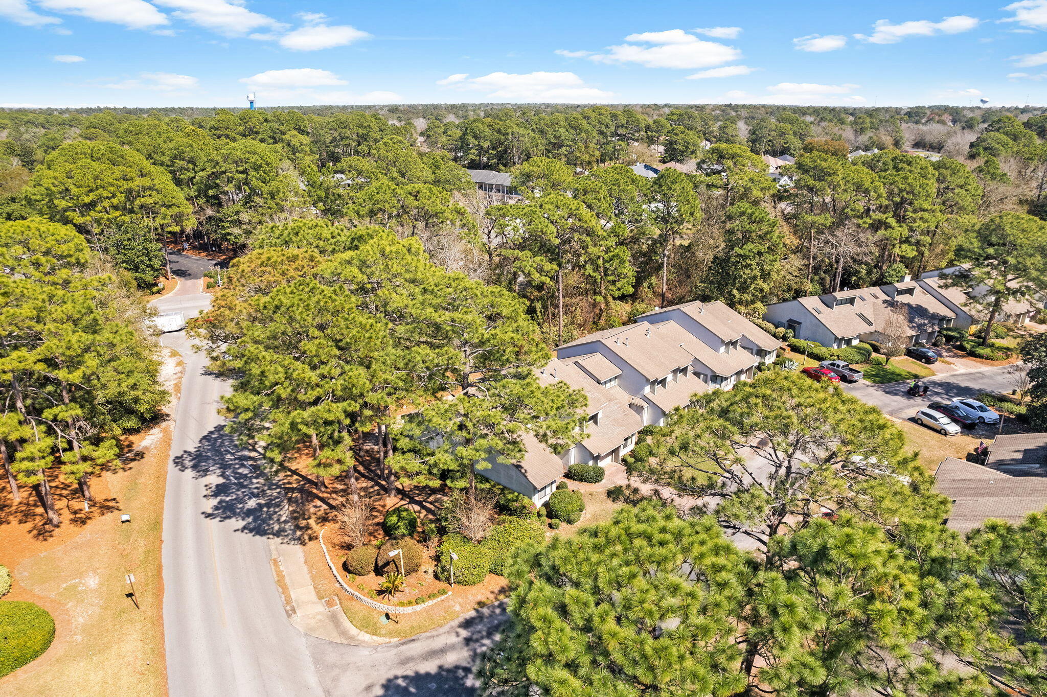 100 Gleneagles Drive Niceville, FL 32578 - Photo 17 of 60 an aerial view of residential building with parking space