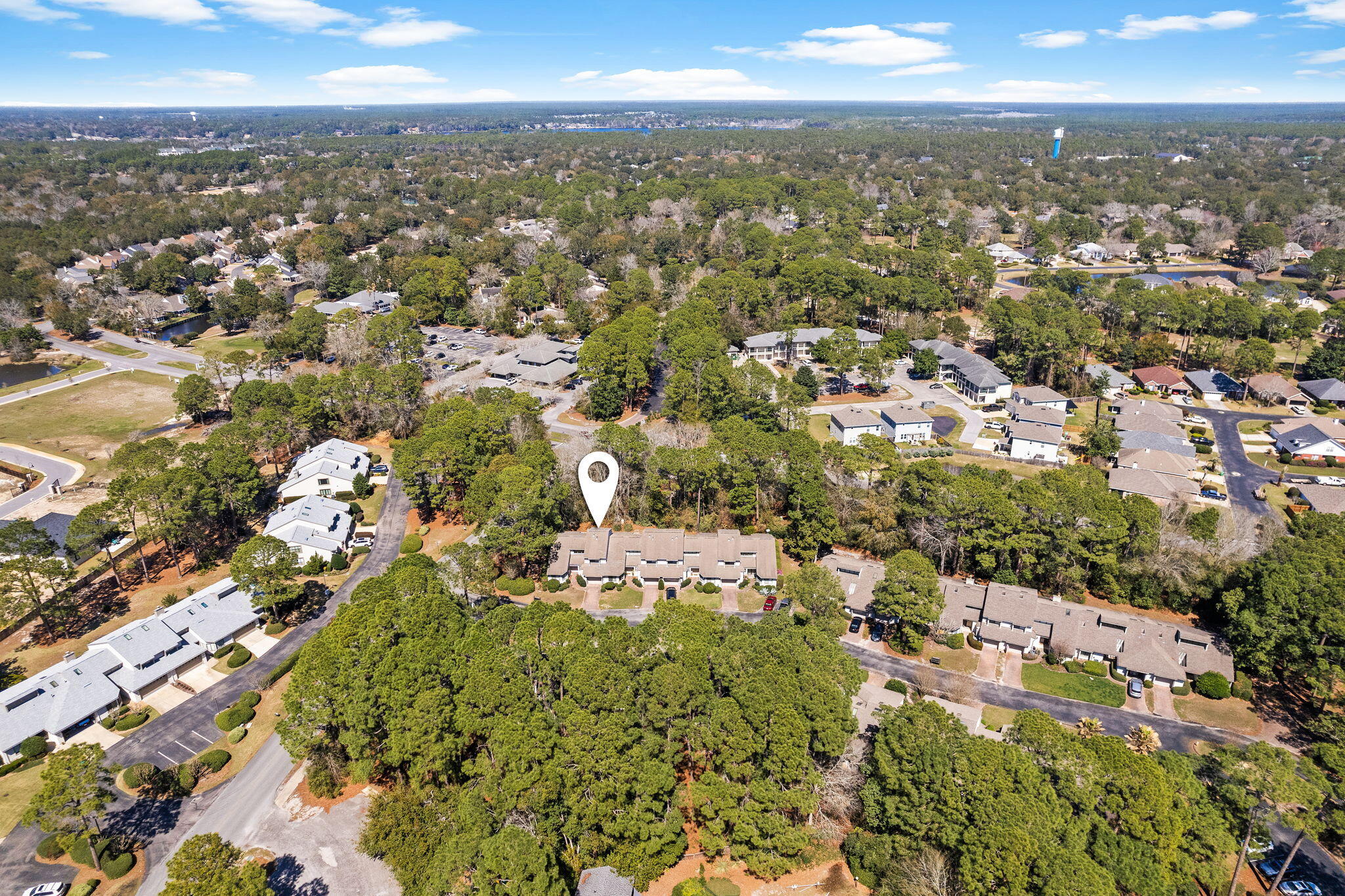 100 Gleneagles Drive Niceville, FL 32578 - Photo 2 of 60 an aerial view of a city