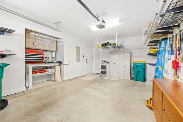 a view of a building with a snow on the road