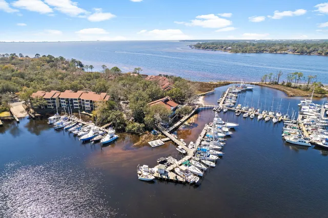 a view of a swimming pool with an outdoor seating