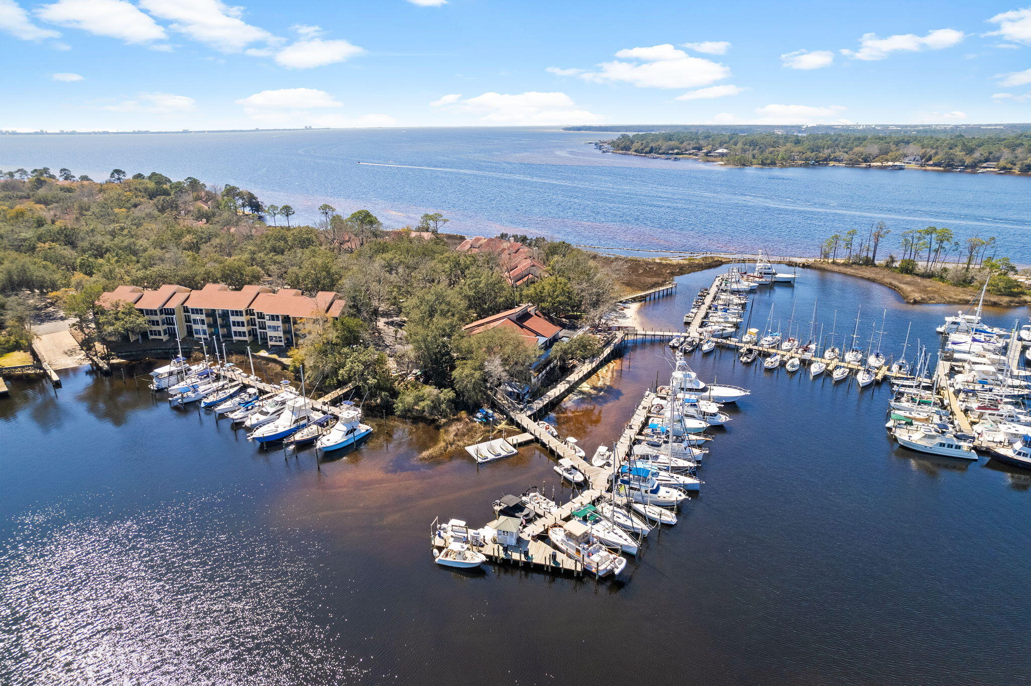 100 Gleneagles Drive Niceville, FL 32578 - Photo 44 of 60 an aerial view of a house with a ocean view