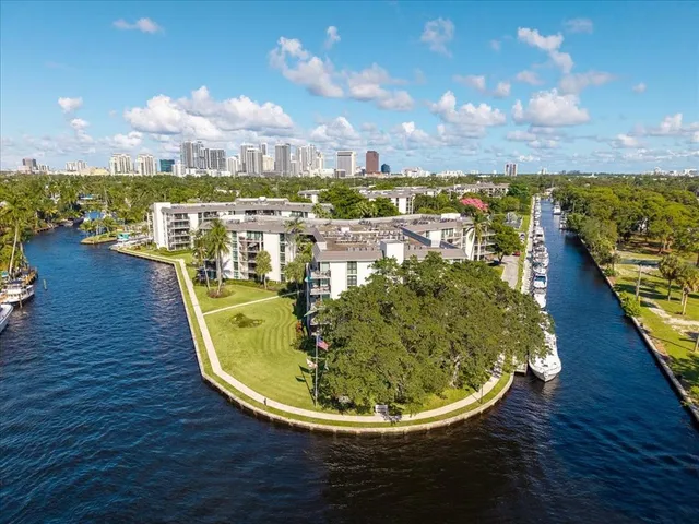a view of a lake with a building in the background