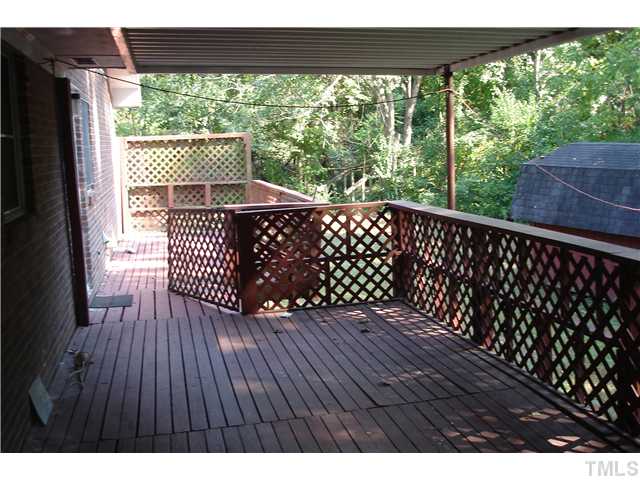 811 Springview Trail Garner, NC 27529 - Photo 6 of 13 Coverd deck leads to additional deck area