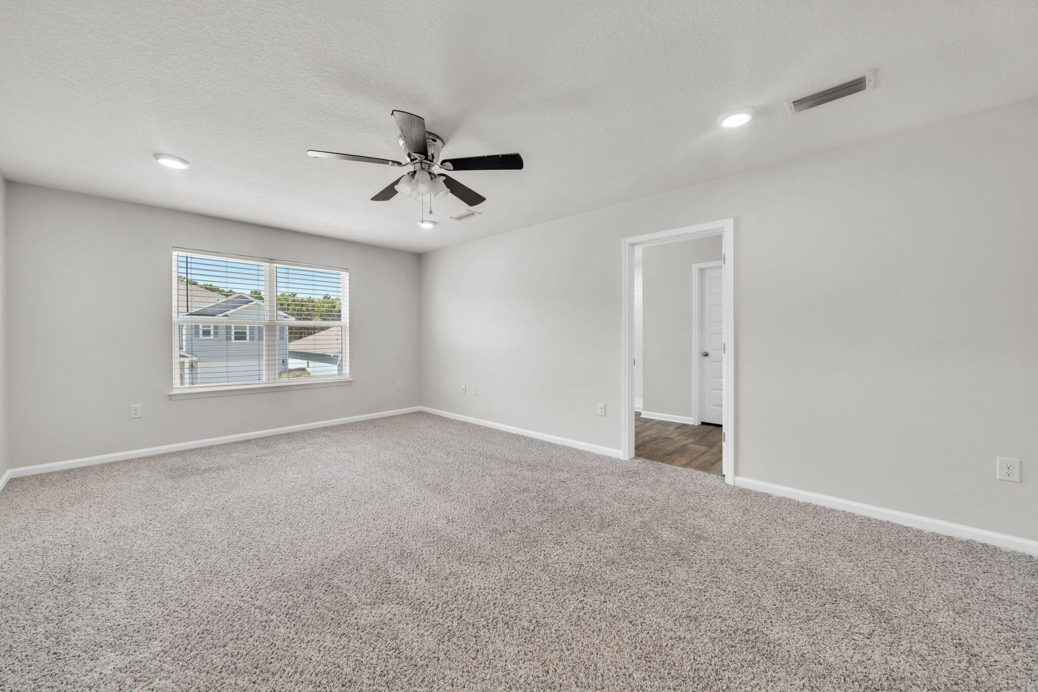 305 This Way Freeport, FL 32439 - Photo 17 of 48 a view of an empty room with a window