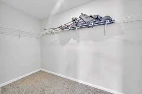 a view of a room with rack on the wall