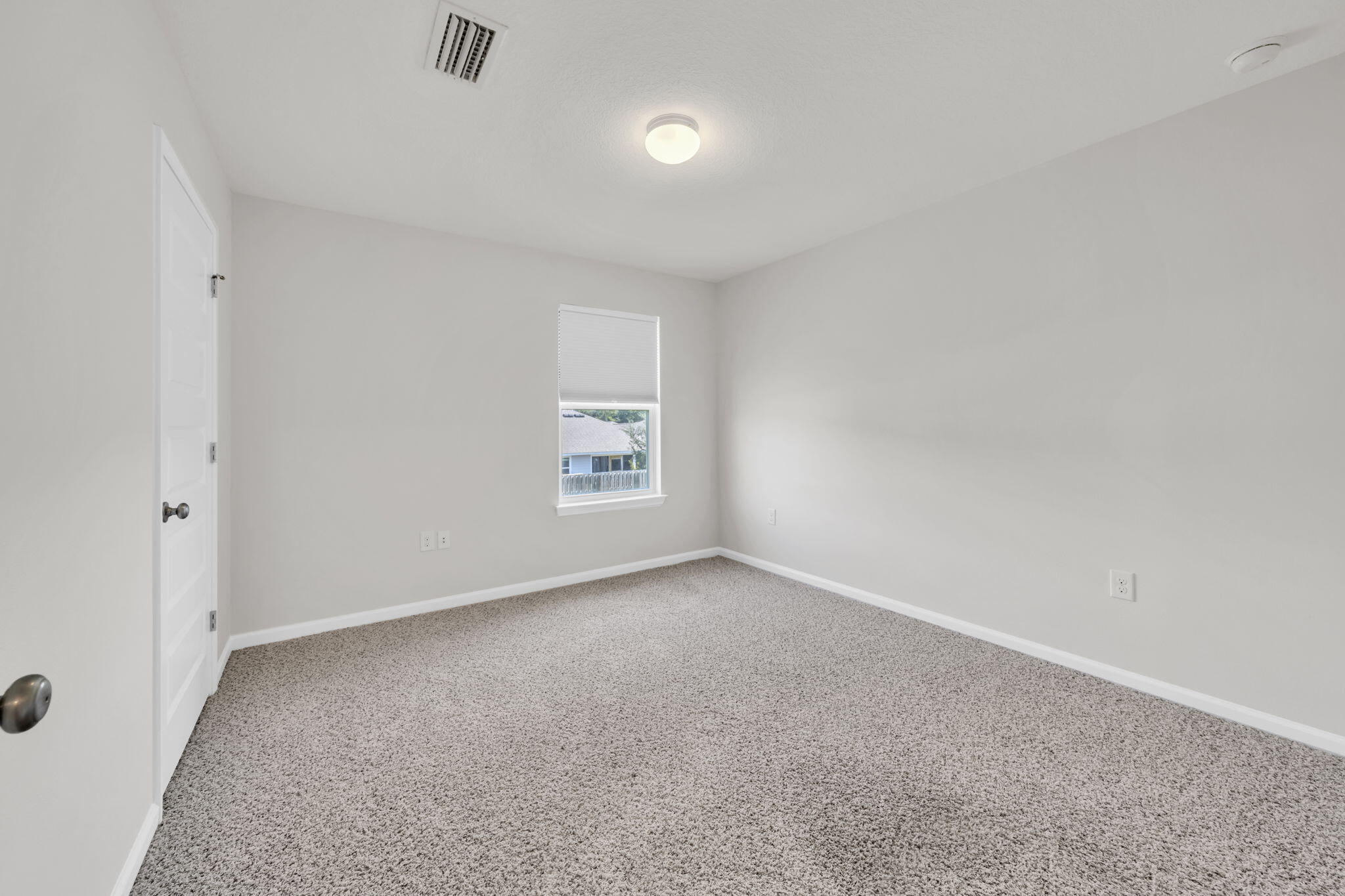 305 This Way Freeport, FL 32439 - Photo 23 of 48 an empty room with windows