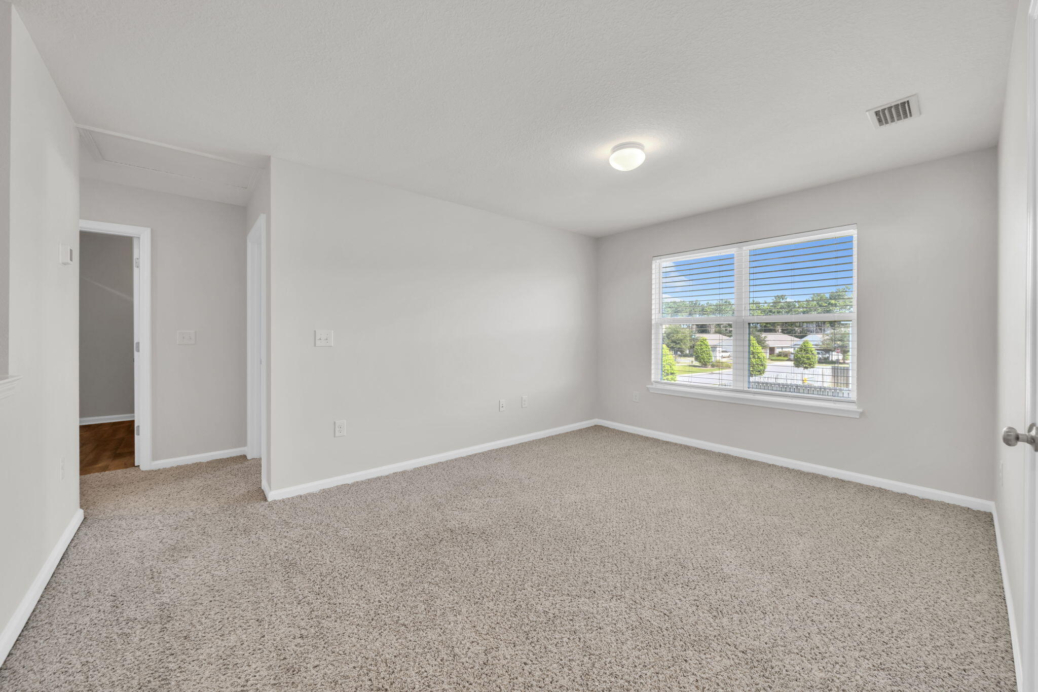 305 This Way Freeport, FL 32439 - Photo 24 of 48 an empty room with windows