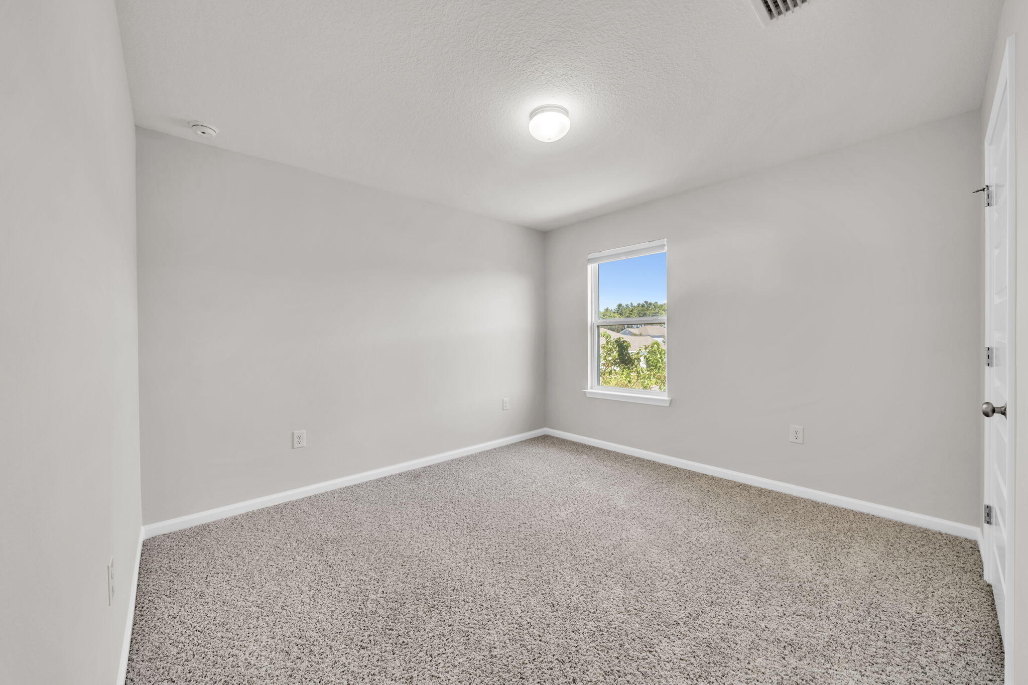 305 This Way Freeport, FL 32439 - Photo 25 of 48 a view of an empty room with a window