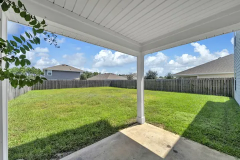 a view of a backyard with a garden