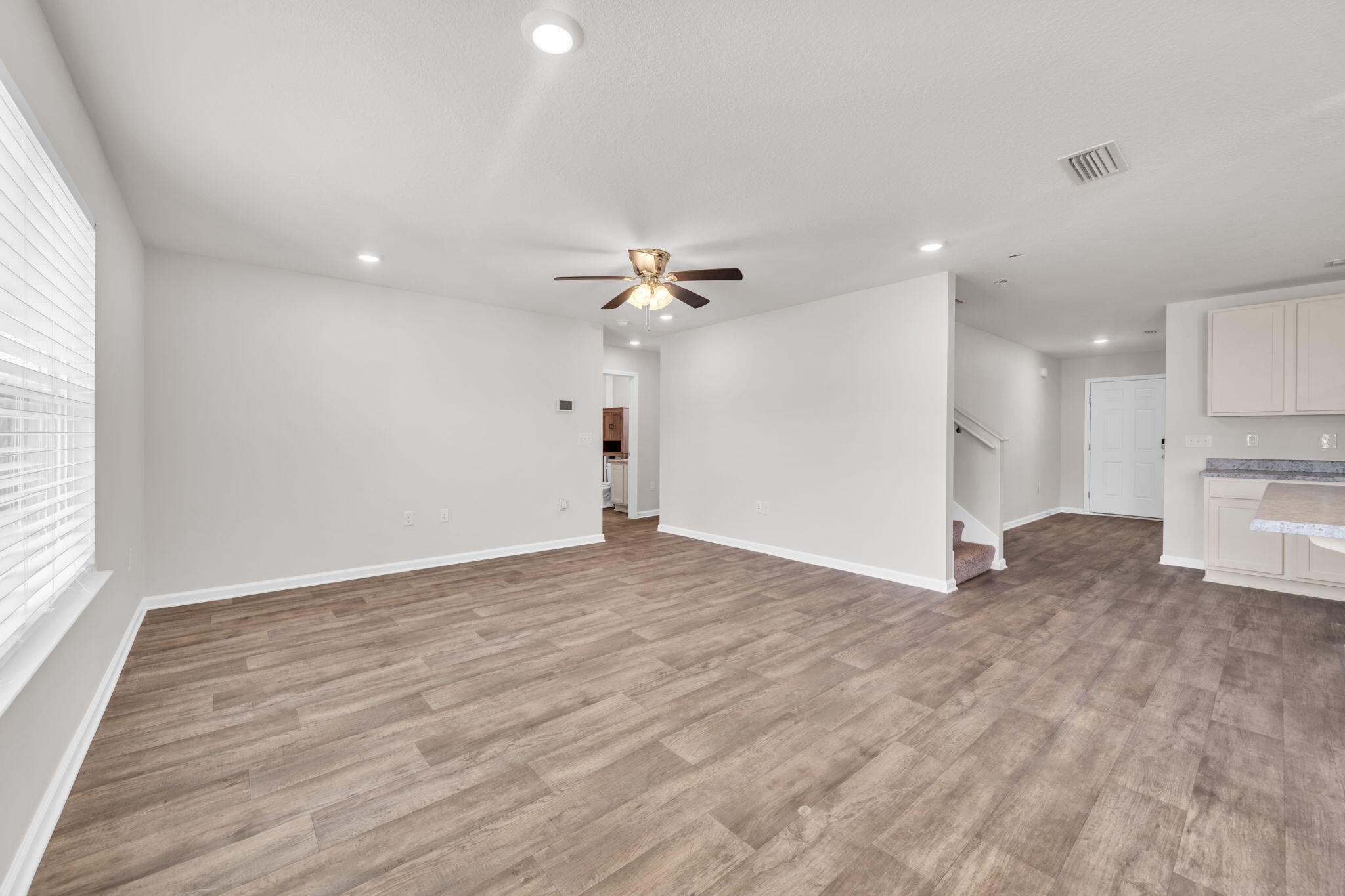 305 This Way Freeport, FL 32439 - Photo 10 of 48 a view of a kitchen with a sink and cabinets