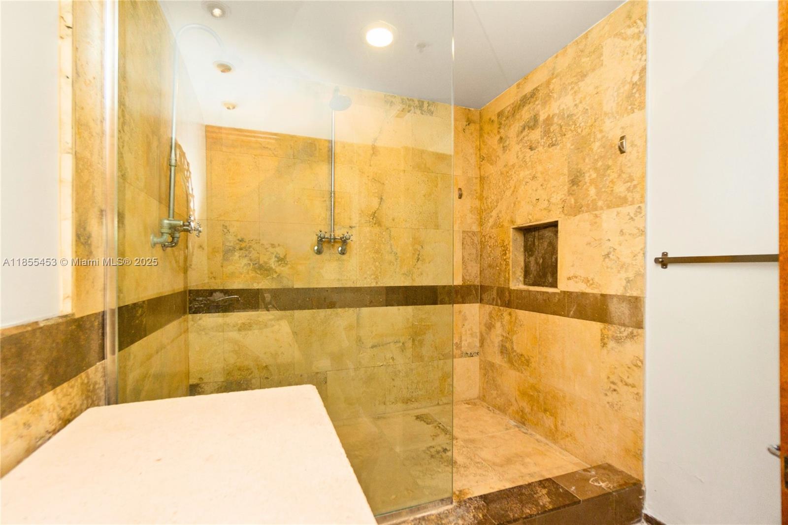 100 Lincoln Road, Unit PH8 Miami Beach, FL 33139 - Photo 22 of 37 a bathroom with a tub