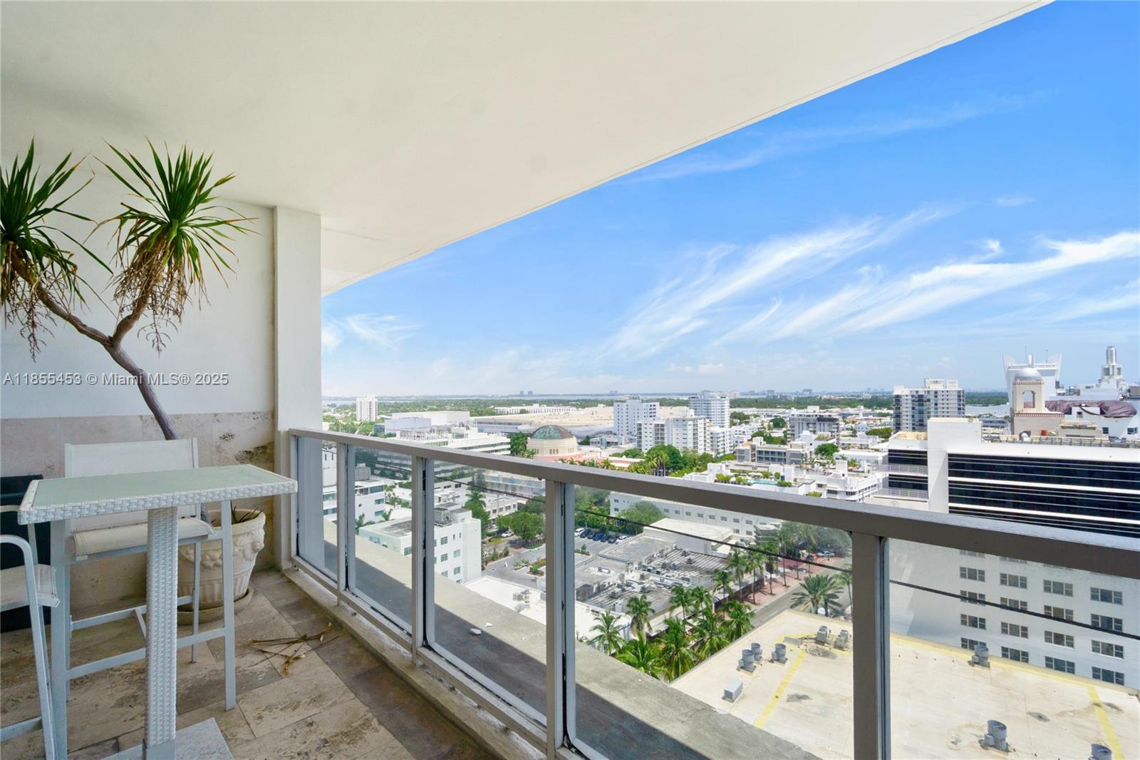 100 Lincoln Road, Unit PH8 Miami Beach, FL 33139 - Photo 25 of 37 a view of a balcony with an ocean view