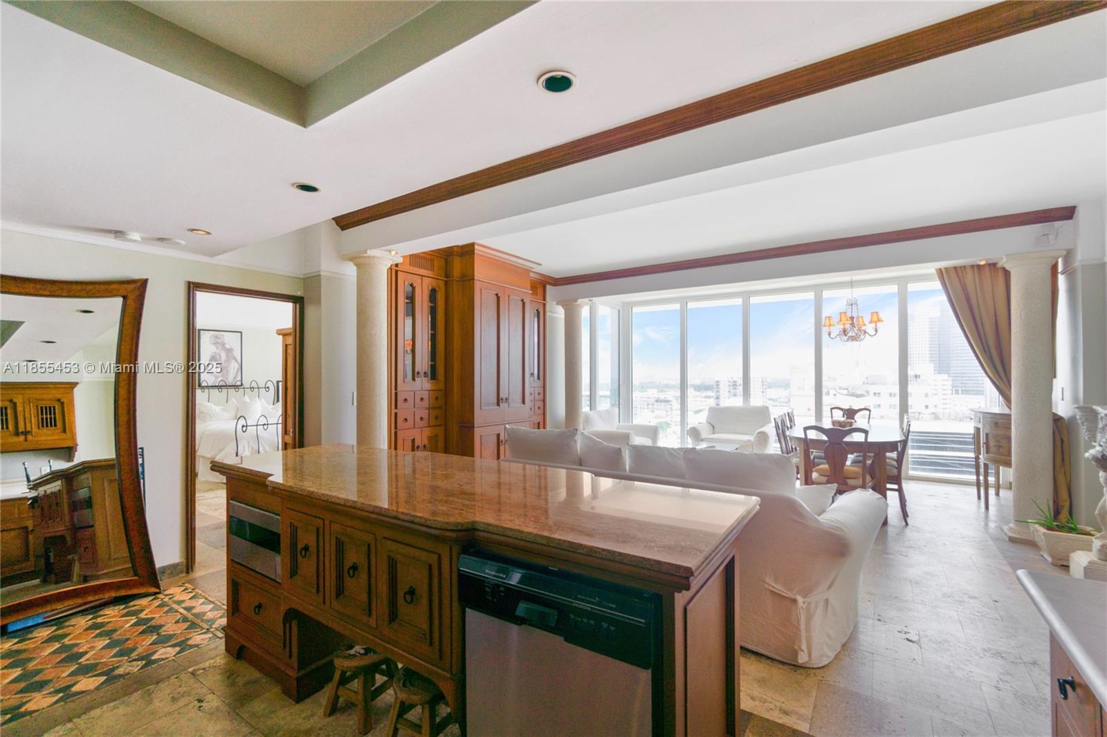 100 Lincoln Road, Unit PH8 Miami Beach, FL 33139 - Photo 5 of 37 a large living room with large windows