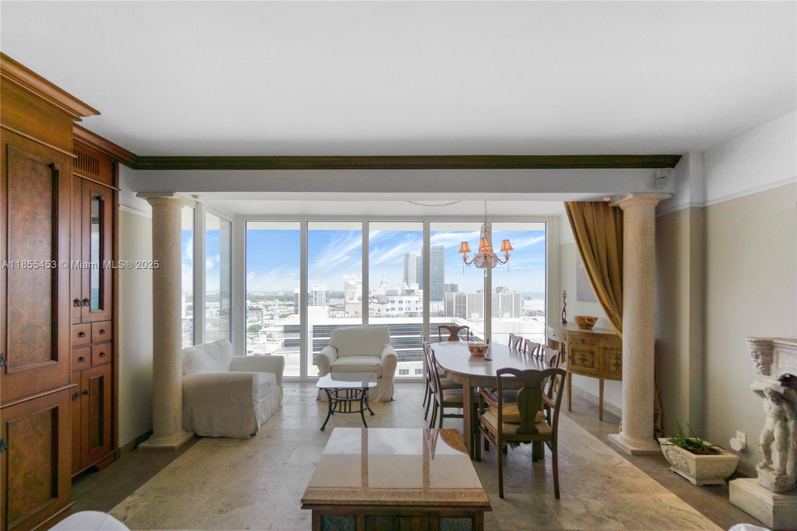 100 Lincoln Road, Unit PH8 Miami Beach, FL 33139 - Photo 6 of 37 a view of a dining room with furniture window and outside view