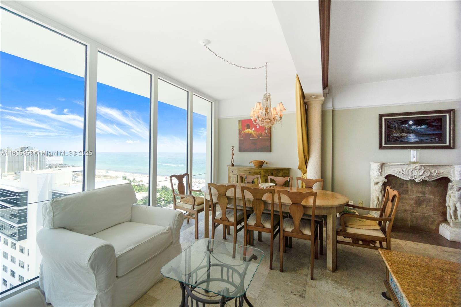 100 Lincoln Road, Unit PH8 Miami Beach, FL 33139 - Photo 7 of 37 a living room with furniture kitchen view and a large window