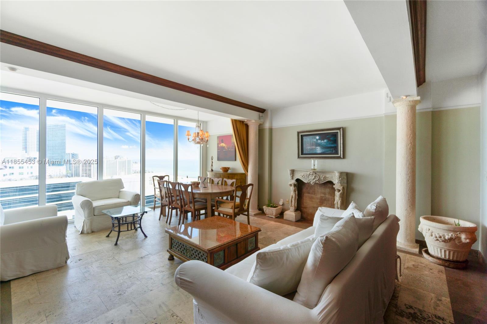 100 Lincoln Road, Unit PH8 Miami Beach, FL 33139 - Photo 10 of 37 a living room with furniture and large windows