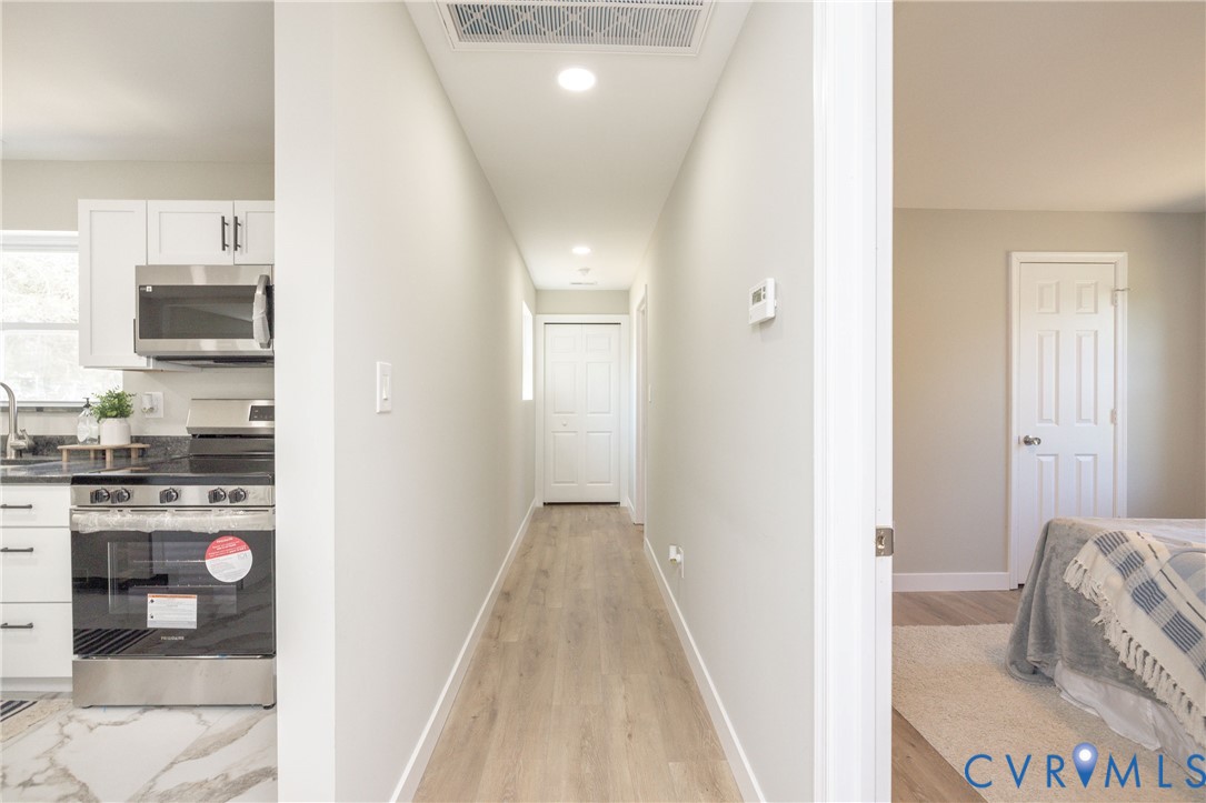 7272 Willson Road Henrico, VA 23231 - Photo 18 of 47 Corridor with recessed lighting and light marble f