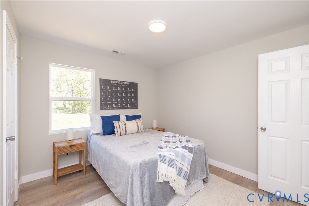 7272 Willson Road Henrico, VA 23231 - Photo 20 of 47 Bedroom with light wood-style flooring