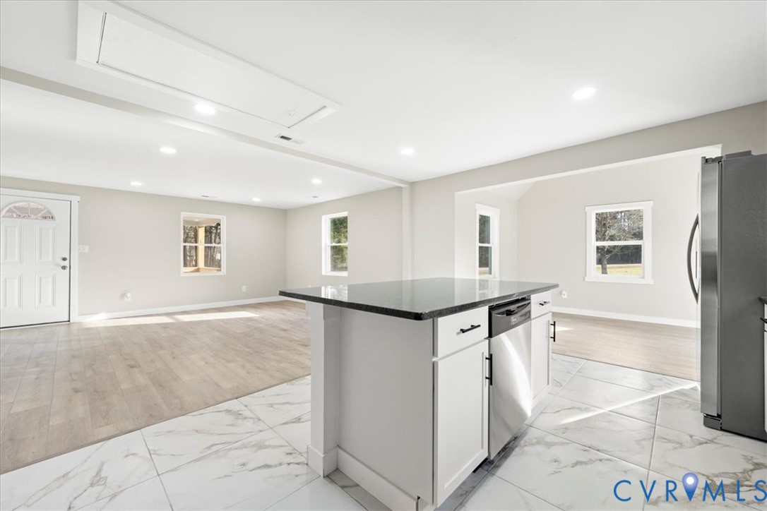 7272 Willson Road Henrico, VA 23231 - Photo 39 of 47 Kitchen with light marble finish flooring, open fl