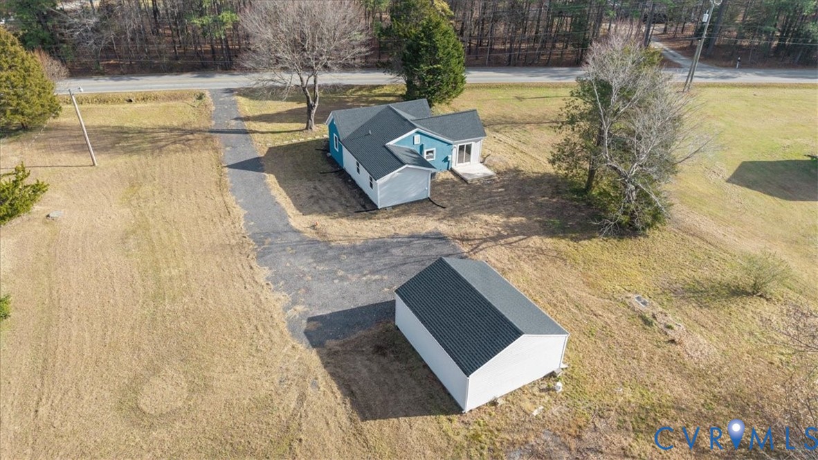 7272 Willson Road Henrico, VA 23231 - Photo 7 of 47 a view of a swimming pool with an outdoor seating