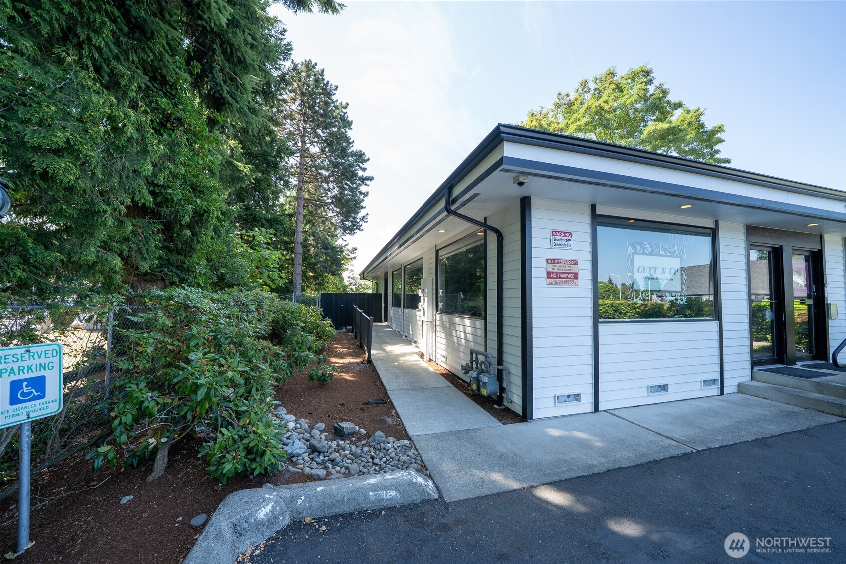 11201 Southeast Kent-Kangley Road, Unit 103 Kent, WA 98030 - Photo 2 of 9 a view of a house with a yard