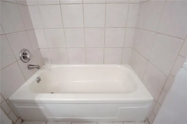 a bathroom with a bathtub
