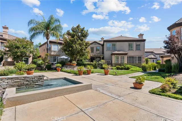 an aerial view of a house with outdoor space