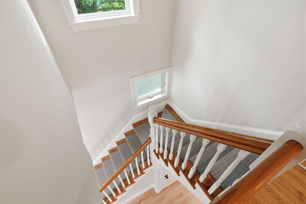 59 Elm Street Hingham, MA 02043 - Photo 17 of 33 a view of stairs and with window