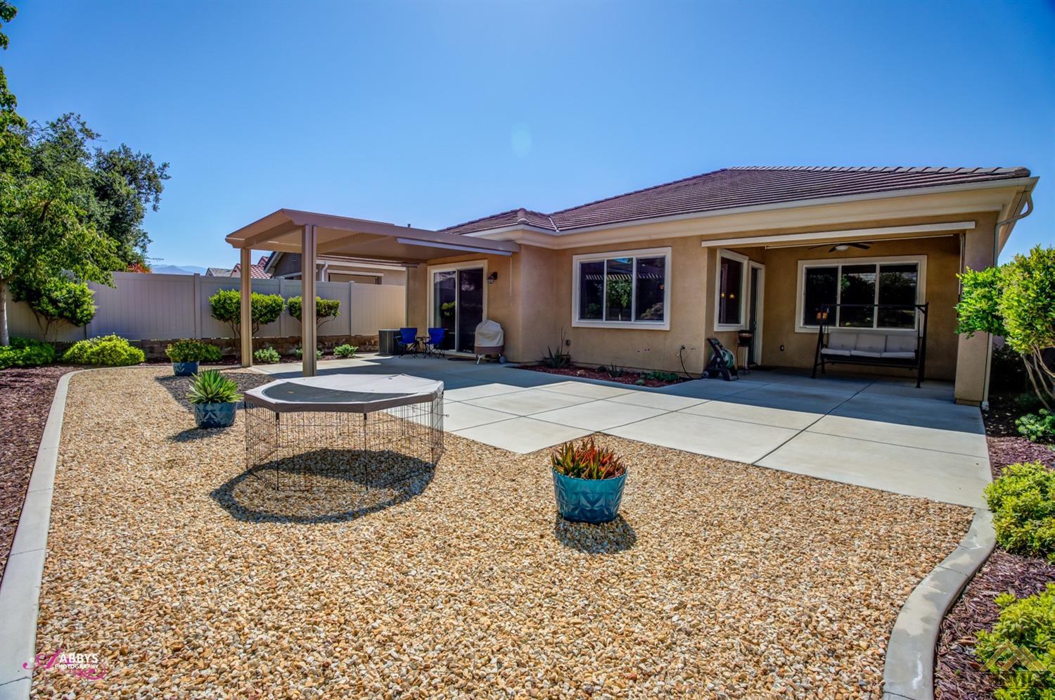 Undisclosed Address Bakersfield, CA 93306 - Photo 28 of 48 a house view with a seating space