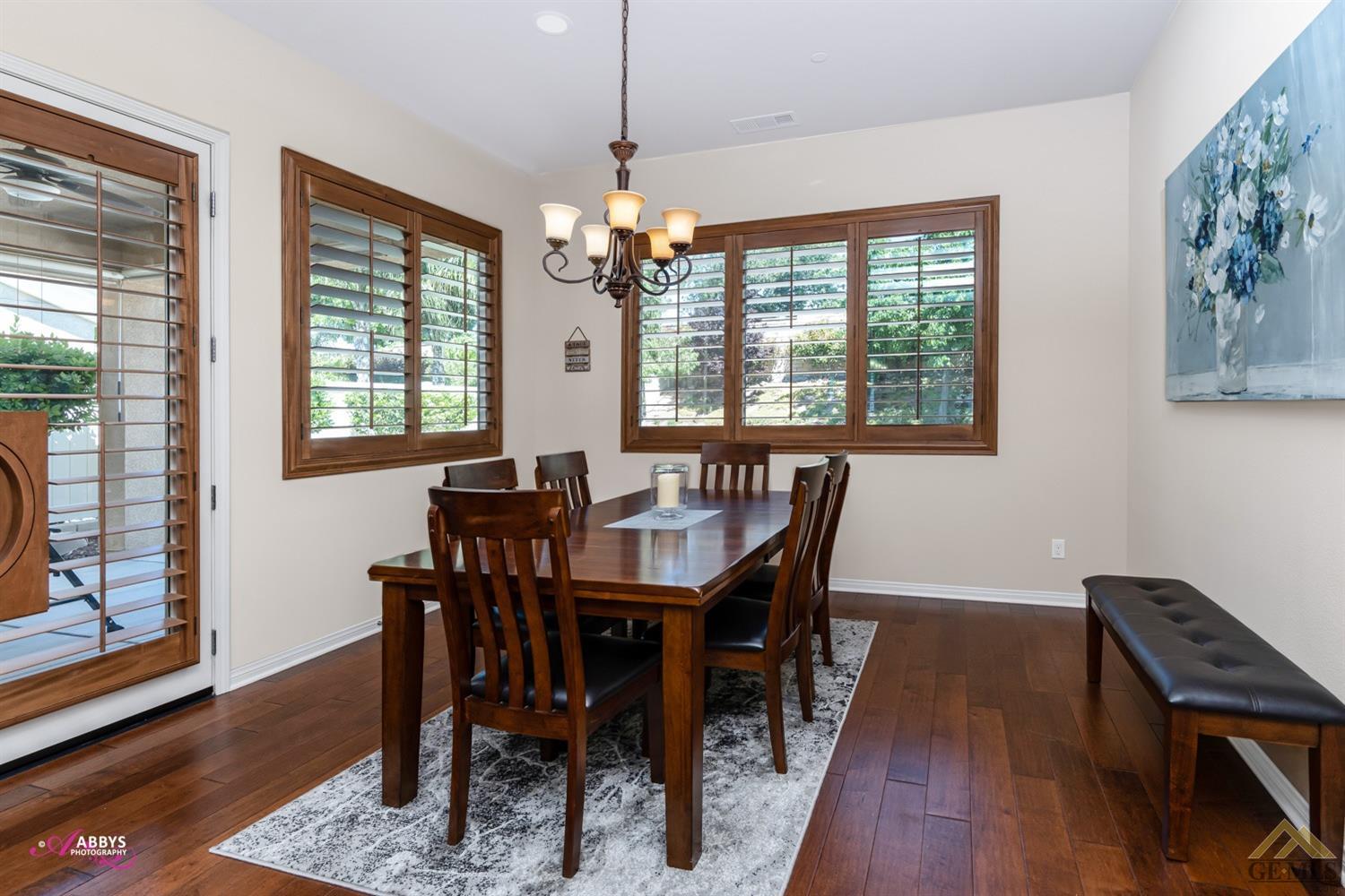 Undisclosed Address Bakersfield, CA 93306 - Photo 9 of 48 a view of a dining room with furniture window and wooden floor