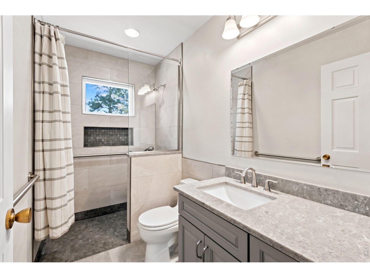 2121 18th Street Road Greeley, CO 80631 - Photo 29 of 40 Upstairs additional bath is all brand new with walk-in shower.