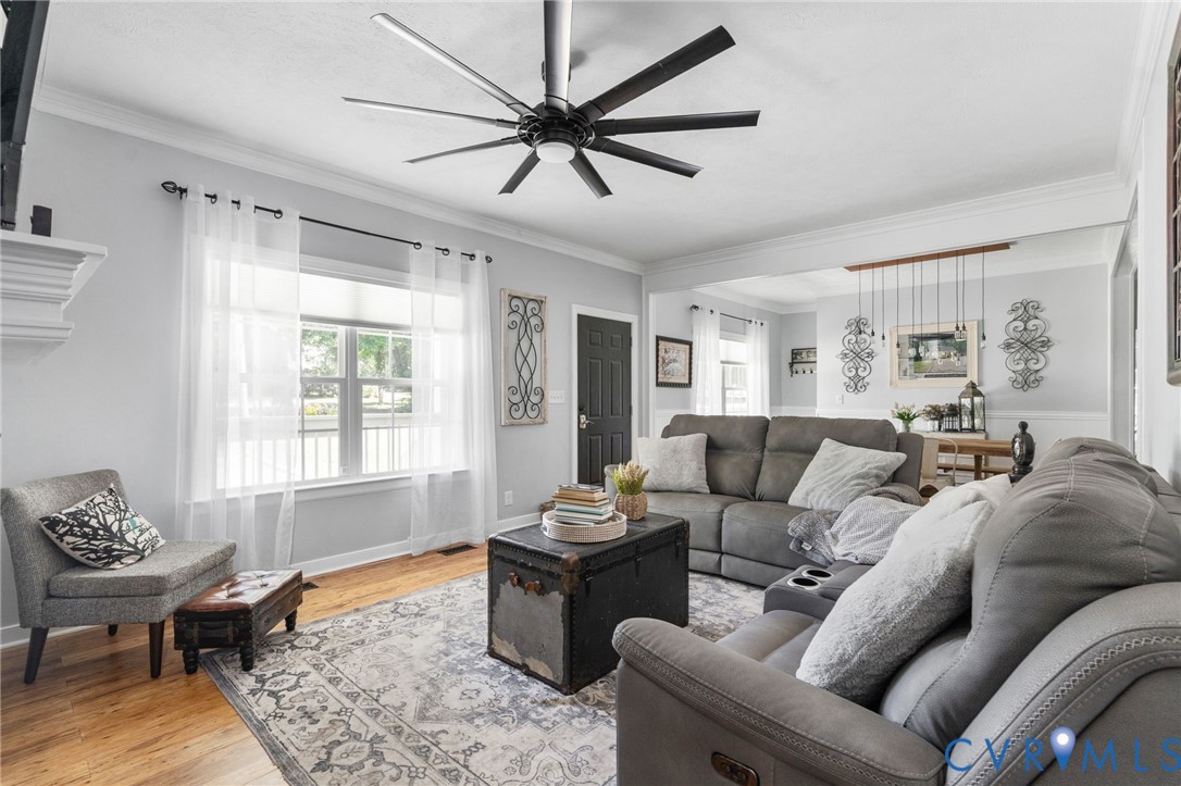 1755 Dispatch Road Quinton, VA 23141 - Photo 16 of 86 a living room with furniture ceiling fan and a window