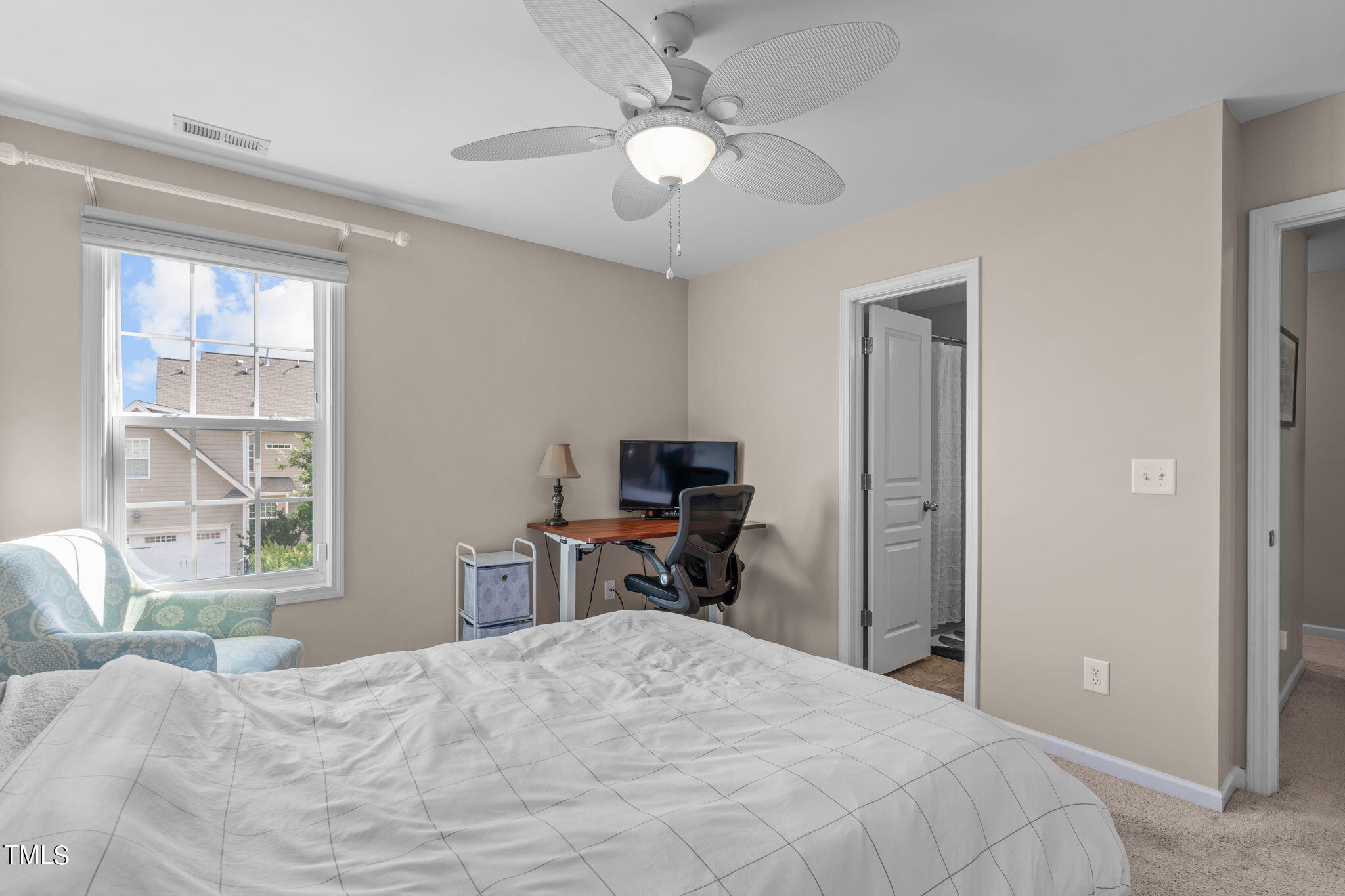 1307 Still Monument Way Raleigh, NC 27603 - Photo 23 of 40 a bedroom with a bed and a window