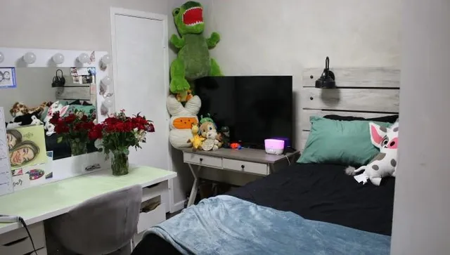 a room with a table and chairs