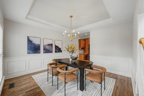 a view of entryway with wooden floor